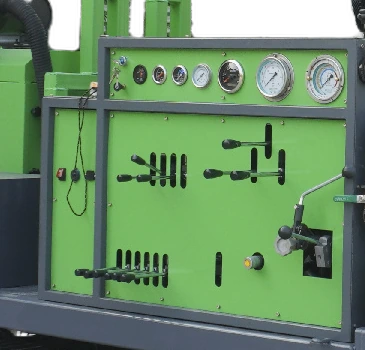 DR-100X Core Drilling Rig side console with gauges and manual levers