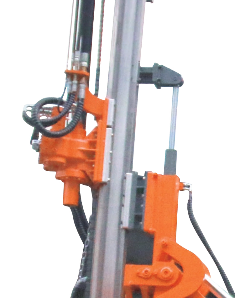 DR-90T orange rotary head, silver feed beam and curved hydraulic hoses